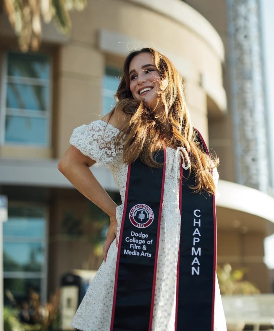 Mia Bella McGarity at Chapman University graduation, wearing a Dodge College of Film and Media Arts sash